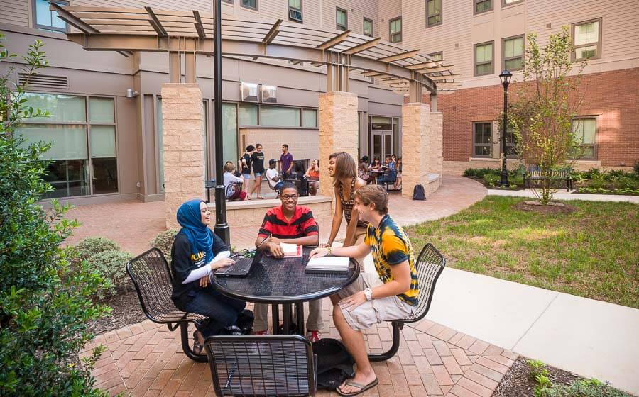 Students sitting at outdoor table