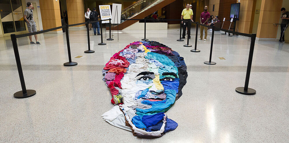 School of Business artist in residence Noah Scalin’s installation, “Portrait of Innovation: Maggie Walker”