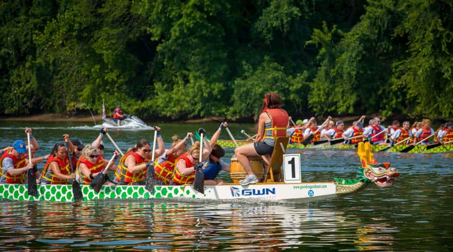 Boats in the James River decorated with dragons