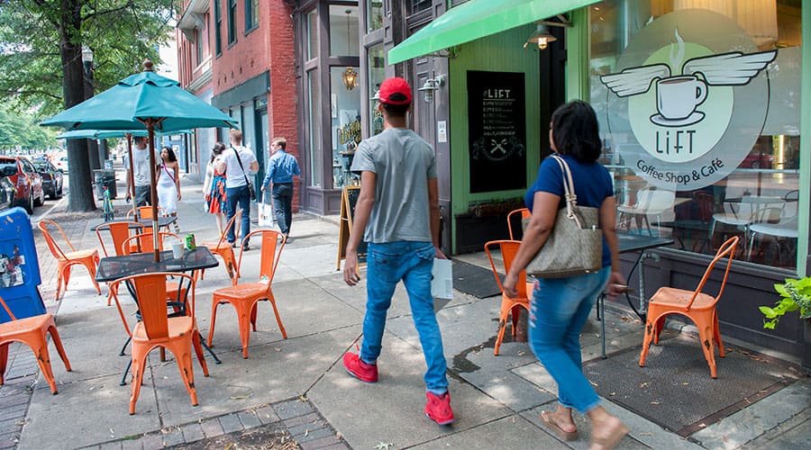 Pedestrians walk past Lift Cafe