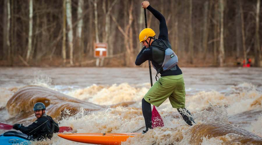 Two men kayaking in rapids of James River