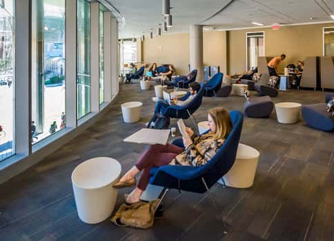 Students studying inside Cabell Library