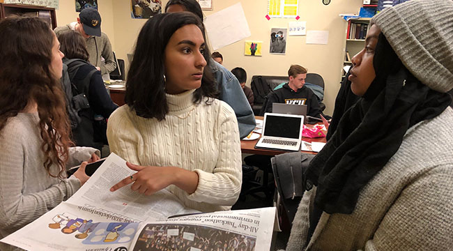 Students working in the Commonwealth Times office.