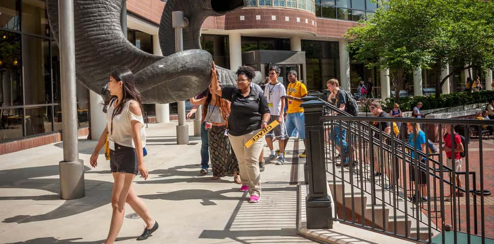 Students make wishes at the Ram Horn