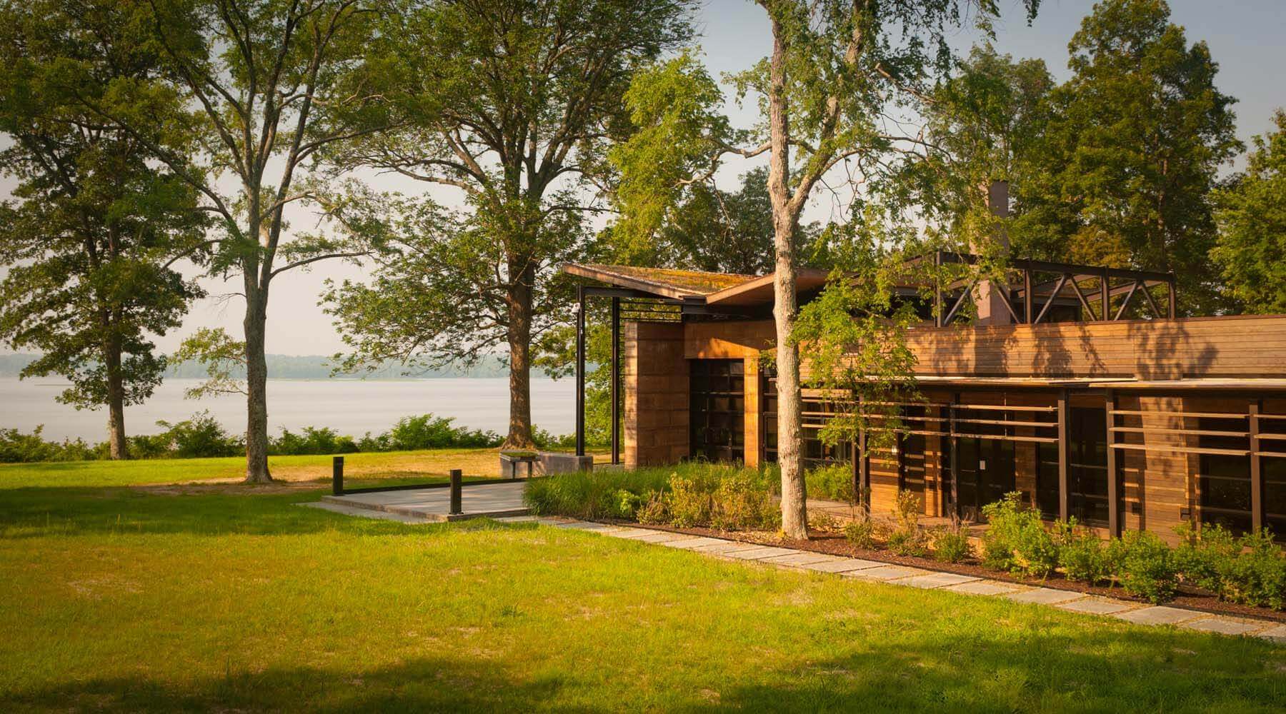 Exterior of VCU Rice Rivers Center building with river in background